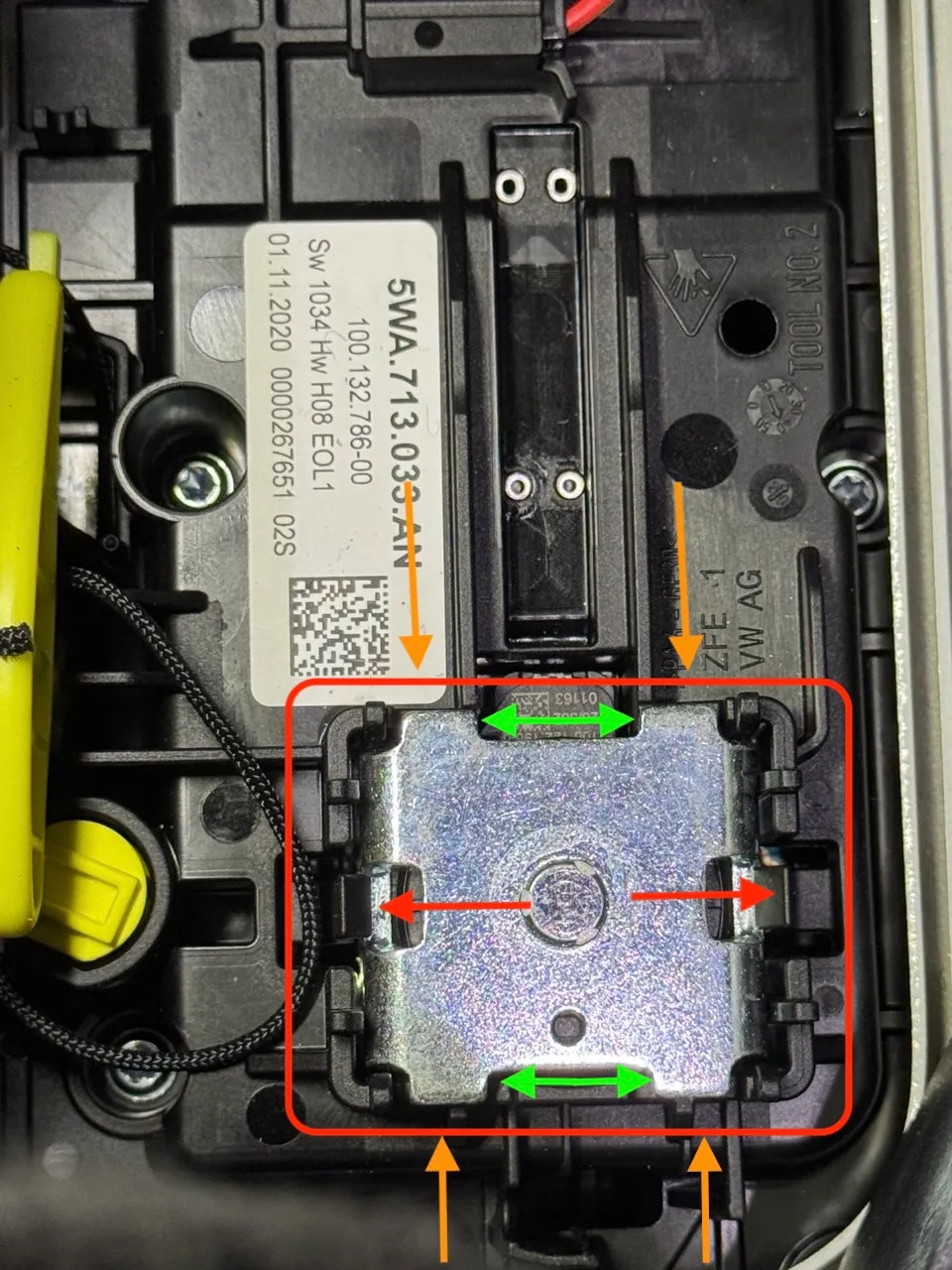 Solenoid retaining tabs and pry points on the housing